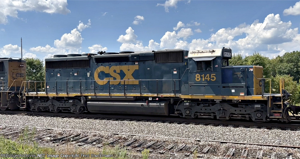 CSX 8145 has died along the way, leaving the crew to haul a loaded coke train with one unit.